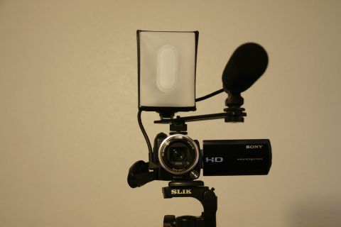 1993 Ford Taurus - Sony Handycam camcorder with external microphone and LED light attached to a tripod mount.