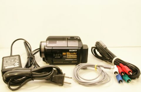 1993 Ford Taurus - Sony Handycam camcorder and its included accessories are laid out on a white surface.