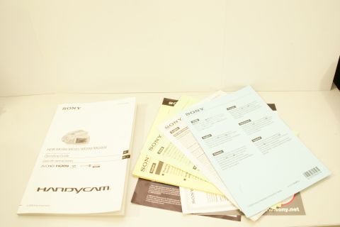 1993 Ford Taurus - Several Sony Handycam instruction manuals are fanned out on a white surface.