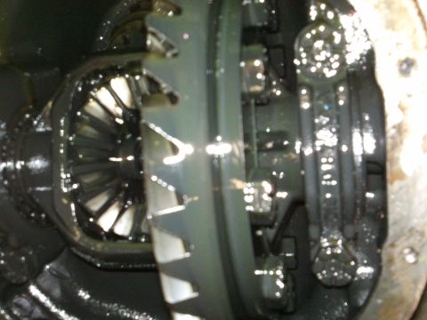 1998 Ford Crown Victoria - Differential gears are visible in this close-up shot, covered in oil.