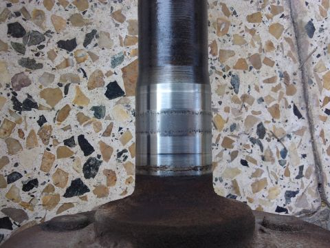 1998 Ford Crown Victoria - This axle shaft shows significant wear on its bearing surface, indicating potential issues with the differential.