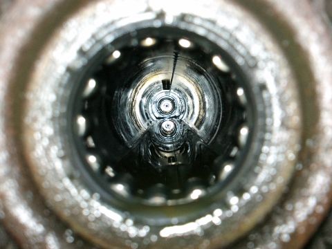 1998 Ford Crown Victoria - Close-up view inside a differential or axle housing, showing internal components and splines.