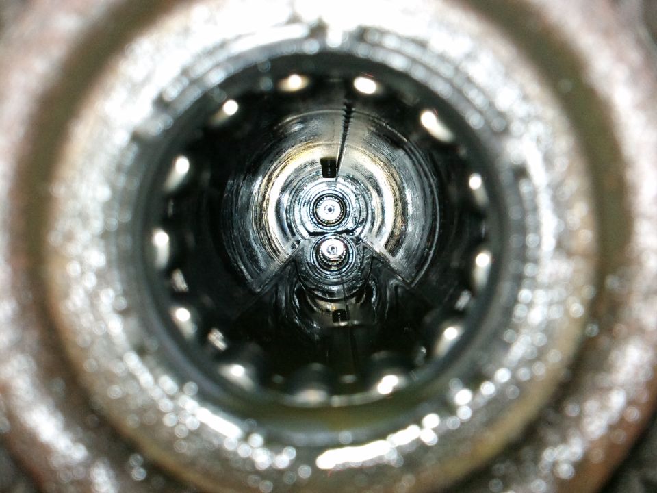 Interior of axle housing with visible splines and bearings