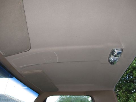 1989 Ford Bronco - New headliner and visors installed. The white marks are where I was thinking of mounting an Explorer OHC.