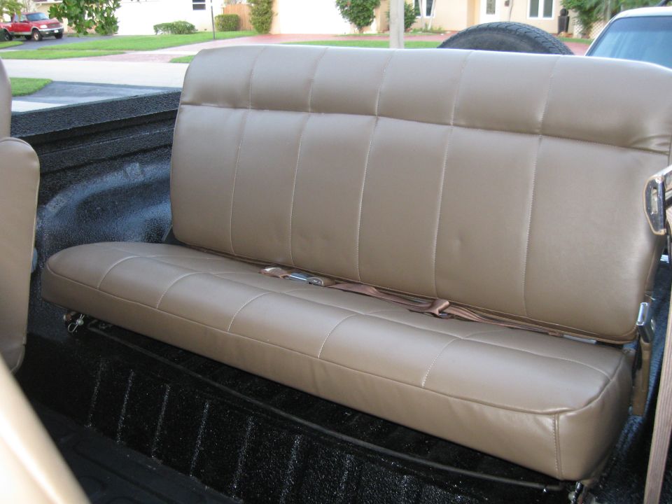 Newly reupholstered seats installed.