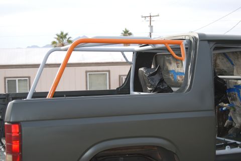 1982 Ford Bronco - This modified Ford Bronco shows a custom roll cage installed over the interior.
