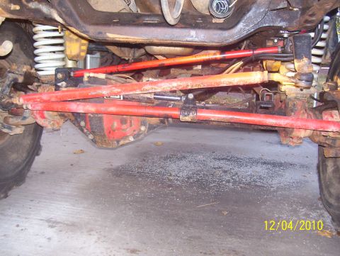 1978 Ford Bronco - Undercarriage view of a modified vehicle, showing suspension and drivetrain components.