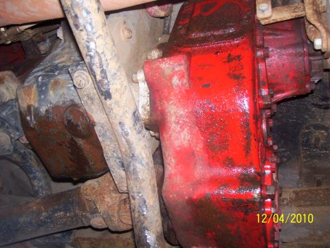 1978 Ford Bronco - Close-up view of a red transfer case and differential assembly, with a date stamp visible in the corner.