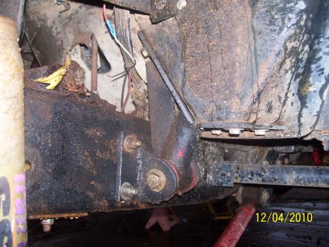 1978 Ford Bronco - Detail shot of vehicle undercarriage, showing frame and suspension parts with visible wiring and date stamp.