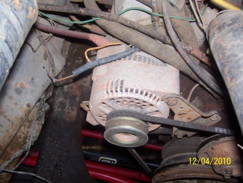 1978 Ford Bronco - This photo shows an alternator and associated engine components, not a complete vehicle.