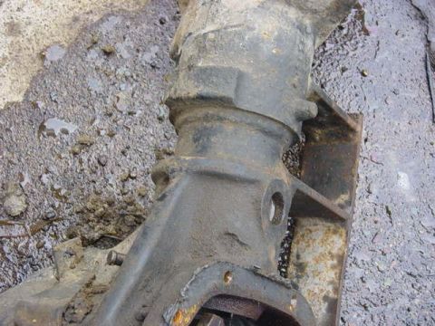 1992 Ford Bronco - Greasy differential housing shown in detail, with a Supermotors logo visible.
