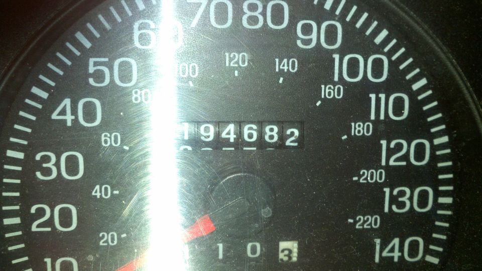 Odometer reads 194682. Speedometer shows 0-130 mph