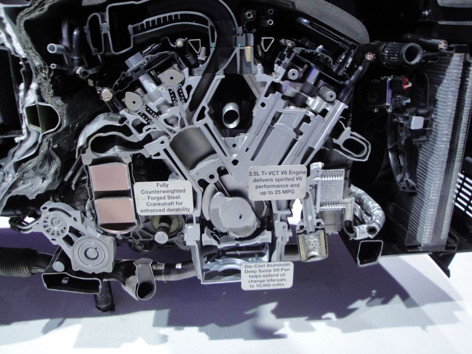 Cutaway view of a 3.5L Ti-VCT V6 engine, showing forged steel crankshaft and aluminum oil pan