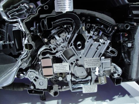 1993 Ford Taurus - A detailed cutaway view of an engine, highlighting its internal mechanics and technological features.