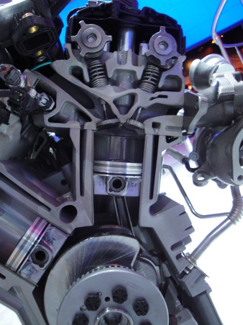 1993 Ford Taurus - A detailed cutaway view of an engine's internal components, including the piston, crankshaft, and valve train.