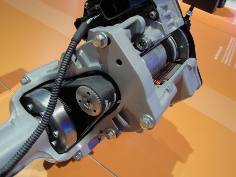 1993 Ford Taurus - A detailed look at a vehicle's internal transmission mechanism, showing gears and a drive belt.