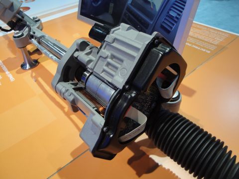 1993 Ford Taurus - A display shows a cutaway of an electric power steering rack and pinion assembly.
