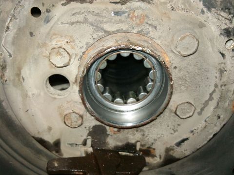 1998 Ford Crown Victoria - This photo shows the splined end of a vehicle's axle shaft, likely for differential work.