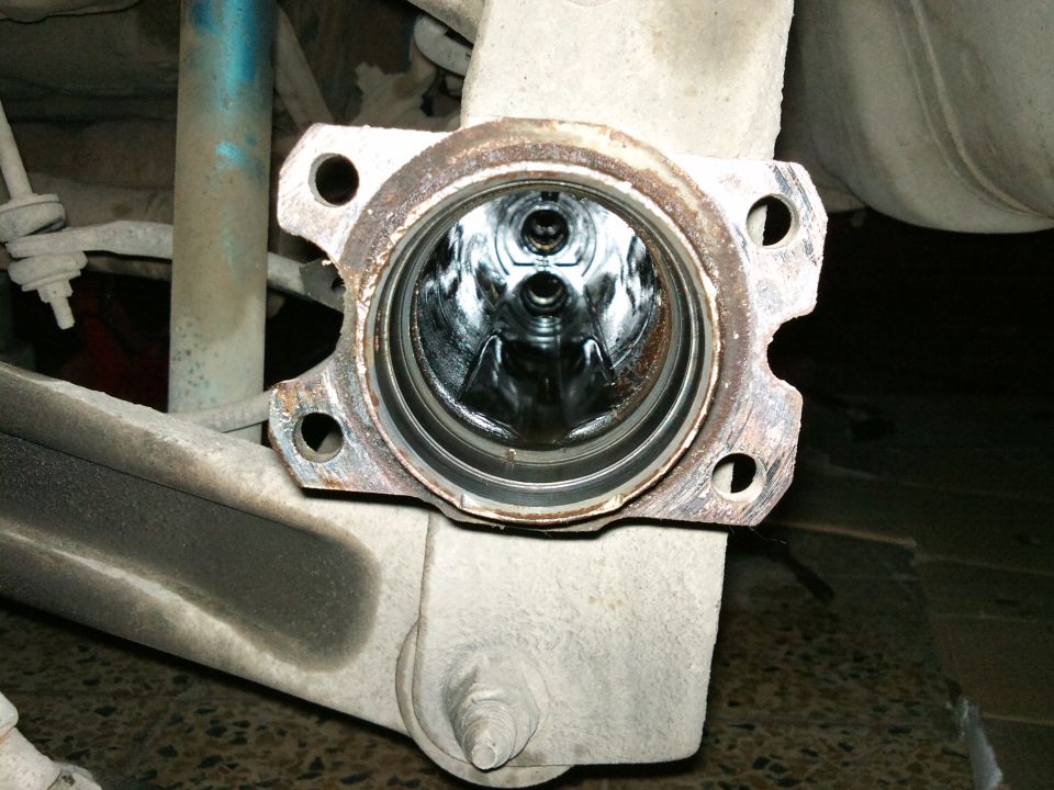 Rear axle differential housing interior with visible gears