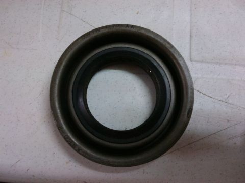 1998 Ford Crown Victoria - Close-up of an axle seal, likely a replacement part.