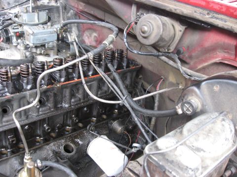 1981 Ford Bronco - Close-up view of an engine bay, showing mechanical components and wiring.