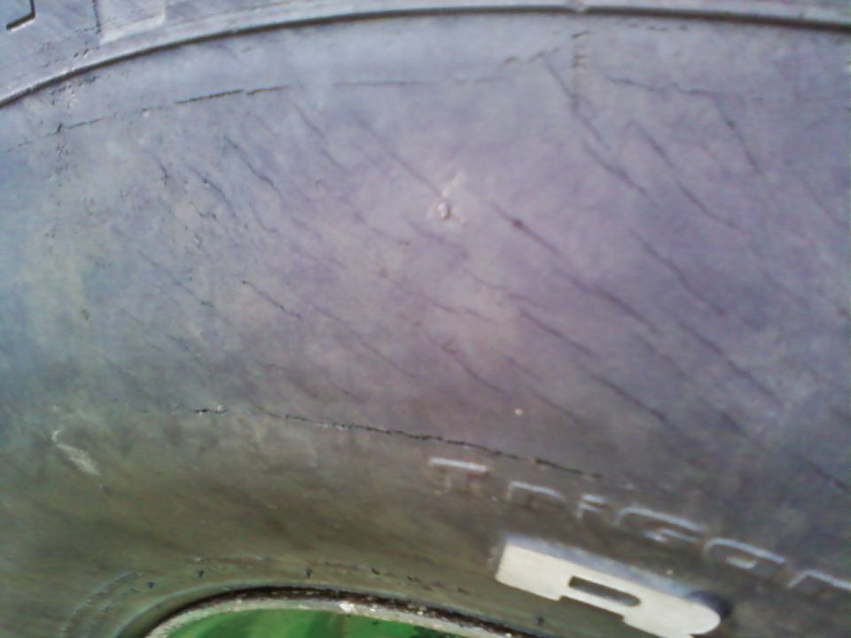 Close-up of a cracked tire sidewall