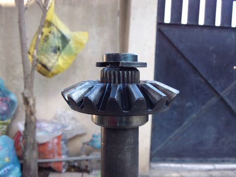 1998 Ford Crown Victoria - A close-up view of a differential gear, detached from any vehicle.