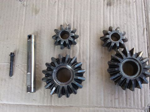 1998 Ford Crown Victoria - Differential gears and a pin are shown, likely for a vehicle's drivetrain.