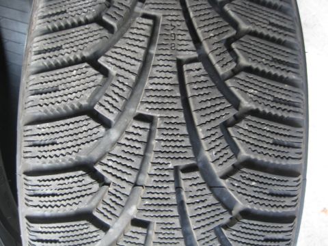 1993 Ford Probe - Tire tread detail, showing tread pattern and some embossed numbers.