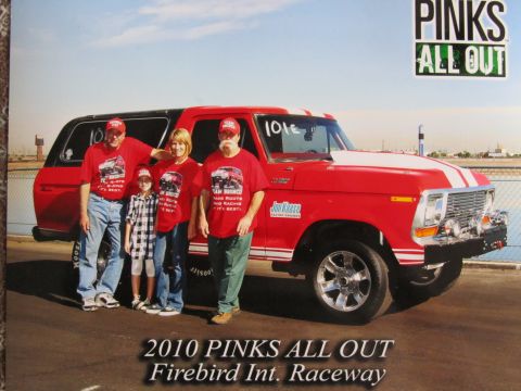 1979 Ford Bronco - A family poses with their red 1978 Ford Bronco at Firebird International Raceway.