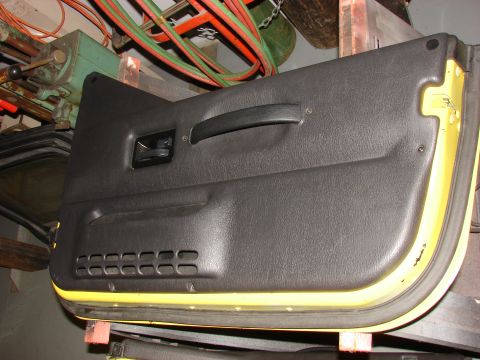 1993 Jeep YJ - A black Jeep YJ door panel is shown, detached from the vehicle.