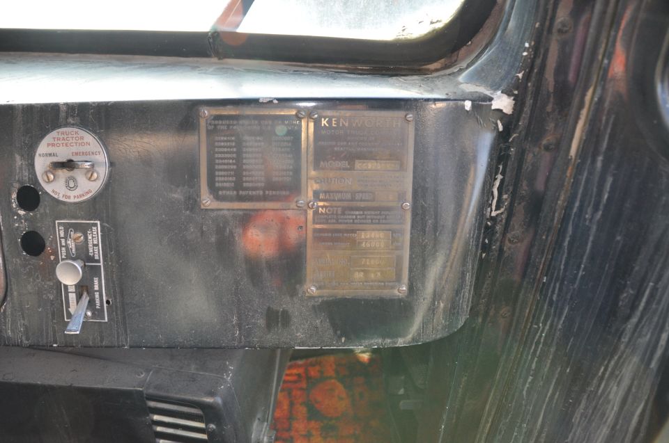 Vintage Kenworth cab dash with brass data plate and tractor protection valve