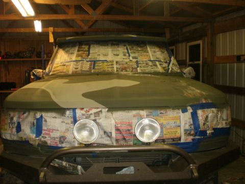1995 Ford Bronco - This SUV is being prepped for a camouflage paint job inside a garage.