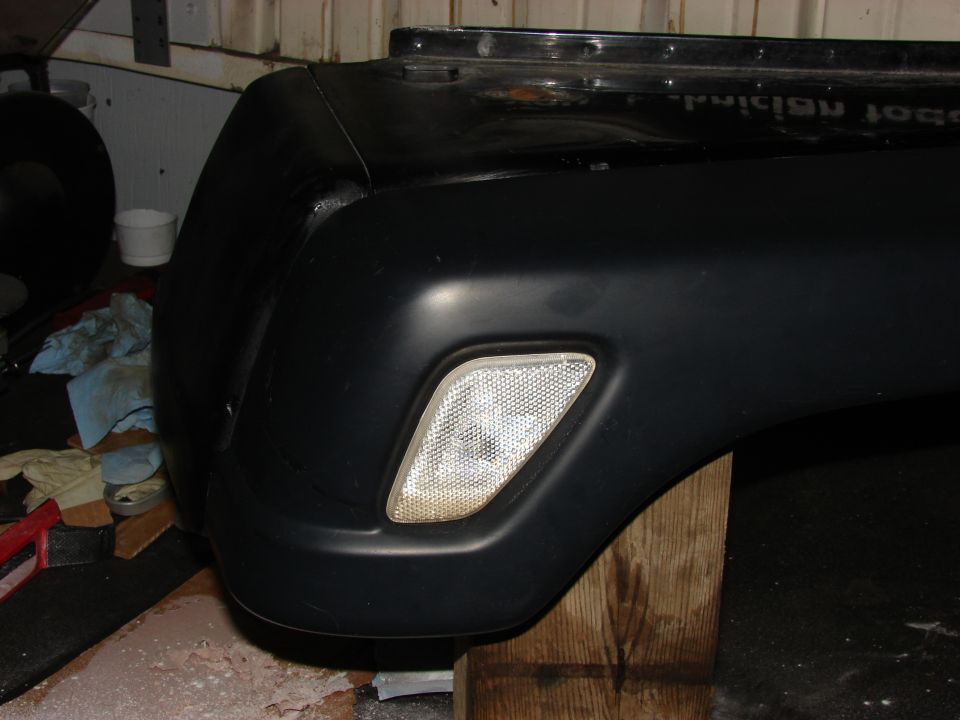 Black Jeep YJ fender and bumper with clear turn signal