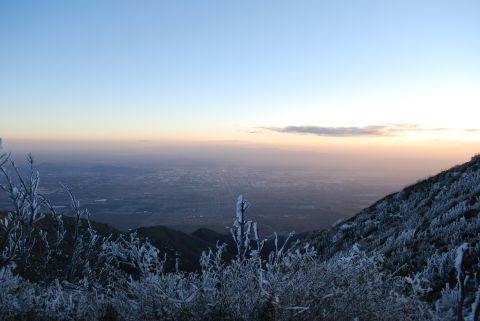 1996 Ford Bronco - Sunrise over a valley from a frost-covered mountain peak.