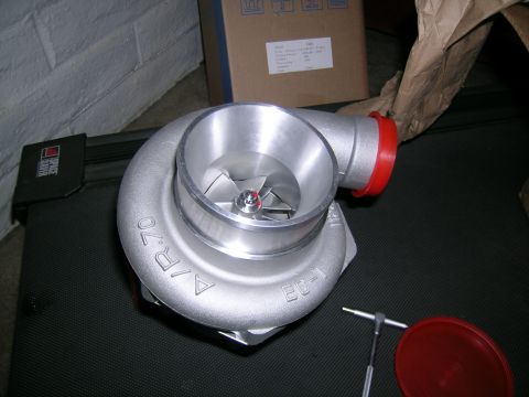 1995 Ford Probe - A turbocharger part is shown, with markings indicating A/R .70 and EC-1, possibly for a custom build.
