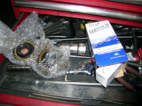 1995 Ford Probe - A box of Clevite 77 engine bearings and some transmission parts are visible in a toolbox drawer.