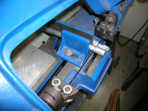 1995 Ford Probe - This photo shows a close-up of a blue metal cutting bandsaw, not a 1995 Ford Probe.