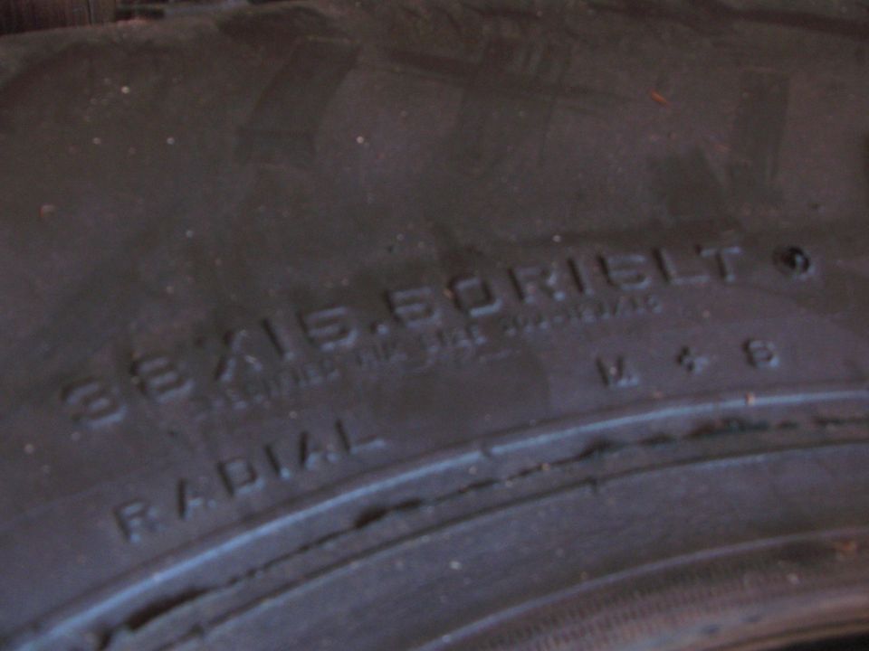 Tire sidewall with text 38X15.50R16LT RADIAL