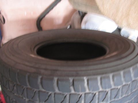 1968 Ford Mustang - A close-up view of a tire tread pattern.