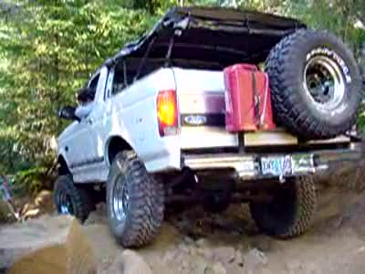 1995 Jeep Wrangler - Mark crawling over the rock on Archers...