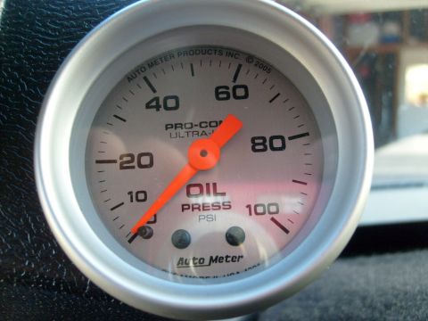 1986 Ford Bronco - This Auto Meter gauge shows the oil pressure reading inside the vehicle.