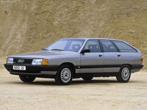 1991 Ford LTD Crown Victoria - This silver Audi 100 Avant is shown from a three-quarter front view, parked outdoors.
