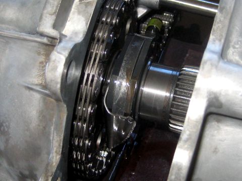 1996 Ford Bronco - A damaged transfer case chain and splined shaft are visible in this close-up mechanical view.