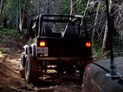 1995 Jeep Wrangler - Wrestling with a big rock...