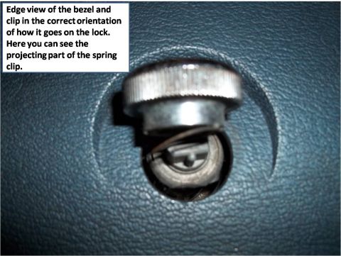 1972 Ford Ranchero - Close-up view of a door lock mechanism with a spring clip, set against a textured blue background.