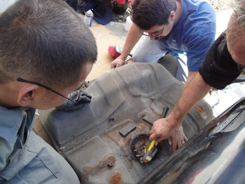 1995 Ford Taurus - Working on a corroded fuel tank, possibly removing or replacing the fuel pump.