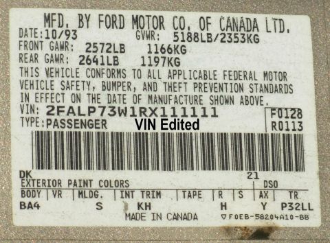 1994 Ford Crown Victoria - Vehicle identification label shows manufacture date of October 1993 and VIN.
