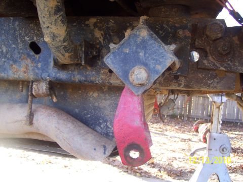 1978 Ford Bronco - Close-up of vehicle undercarriage components, including frame, suspension, and exhaust.