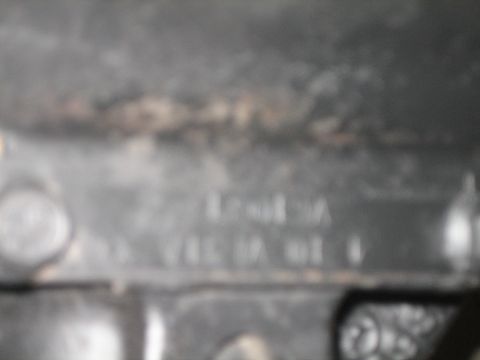 1984 Ford Bronco - Metal part with stamped identification numbers visible.